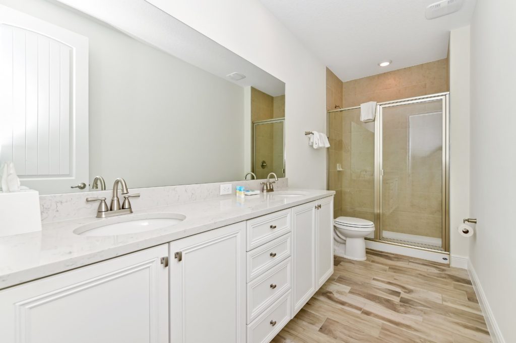 2 Bedroom Villa bathroom with double sinks and walk-in shower