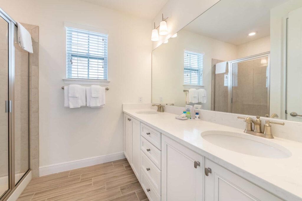 Bathroom 3 with double sinks and walk-in shower: 4 Bedroom Premium Cottage