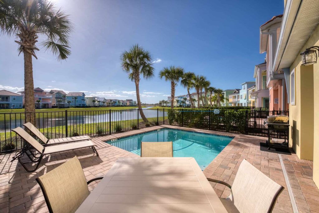 Private backyard with pool overlooking waterfront: 4 Bedroom Superior Cottage