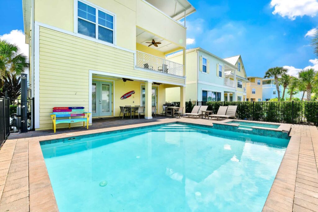 Private backyard with pool, hot tub, covered lanai, and two covered balconies: 7 Bedroom Cottage