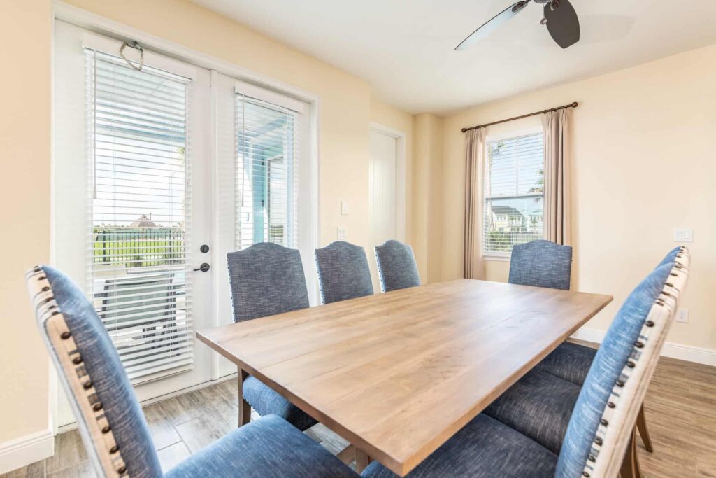 Dining room with table set for 8 people: 7 Bedroom Elite Cottage