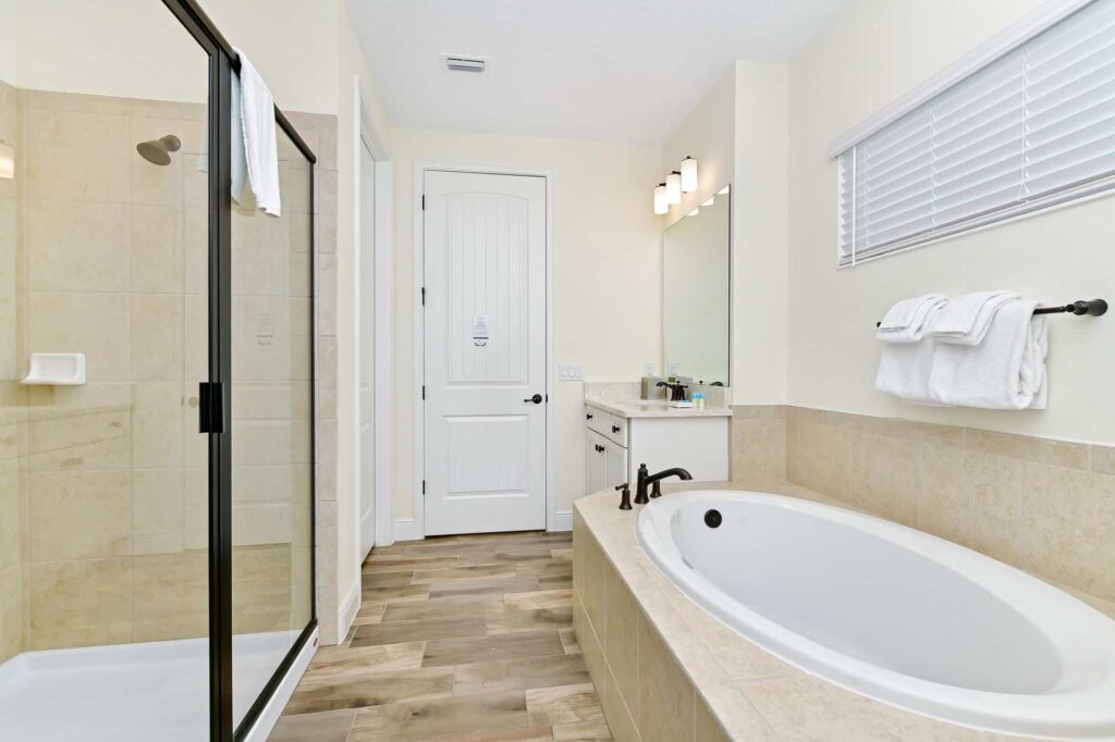Bathroom 8 with walk-in shower and separate bathtub: 8 Bedroom Cottage