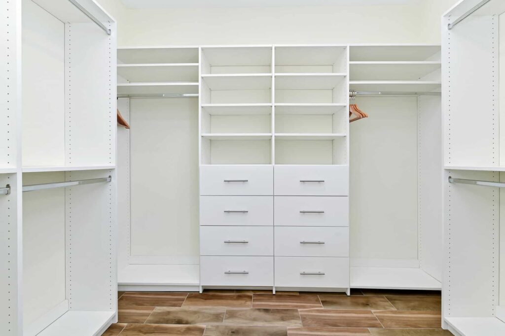 Spacious walk-in closet with multiple shelves: 8 Bedroom Cottage