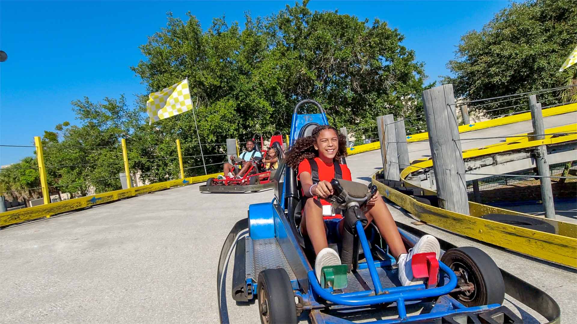 Girl driving a go kart at Fun Spot America in Orlando, Florida