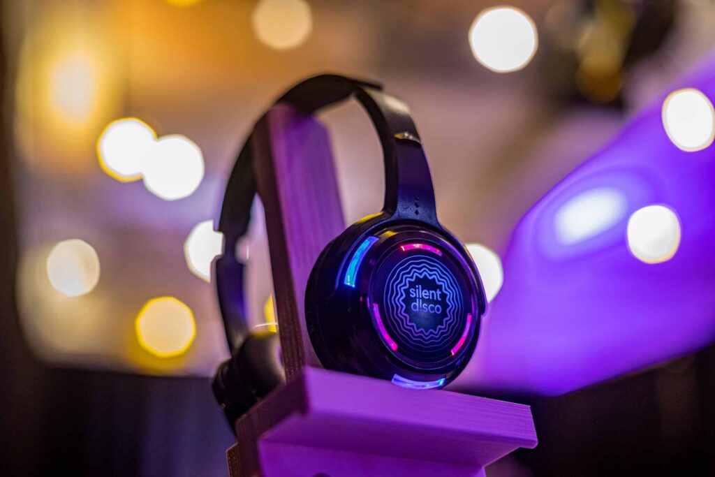 Silent Disco headphones on a stand