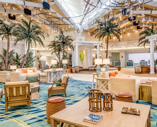 Panorama view of the Margaritaville Resort Orlando hotel lobby.
